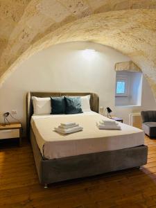 Postel nebo postele na pokoji v ubytování Casa Zia Pina