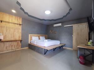 Postel nebo postele na pokoji v ubytování Phattararesort