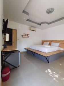 Postel nebo postele na pokoji v ubytování Phattararesort