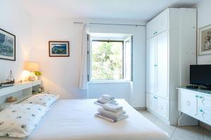 Ένα ή περισσότερα κρεβάτια σε δωμάτιο στο Apartments Zoe