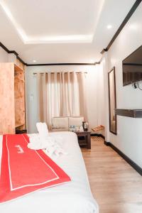 Uma cama ou camas num quarto em Villa Pumalin
