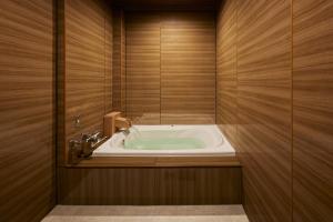 Ванная комната в Yatomi Hotel Nuqu Natural Hot Spring