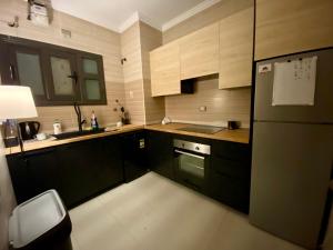 Kuchyň nebo kuchyňský kout v ubytování Madinaty Luxury Home