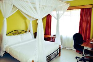 Wagon Wheel Hotel Eldoret客房内的一张或多张床位