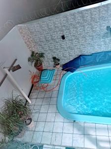 Bazén v ubytování Casa de festa para festa do peão de barretos nebo v jeho okolí