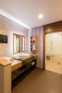 Ванная комната в Yatomi Hotel Nuqu Natural Hot Spring