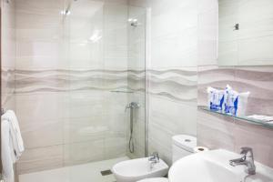 Kúpeľňa v ubytovaní Hotel Valencia