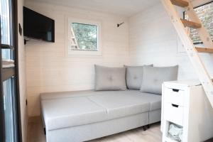 Posezení v ubytování Tiny House Le Poulailler