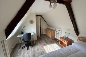 En eller flere senge i et værelse på Le Grand Paradis