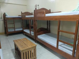 Voodi või voodid majutusasutuse DISADECO Hostel toas
