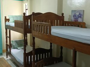 Postel nebo postele na pokoji v ubytování DISADECO Hostel + 1 fotografie