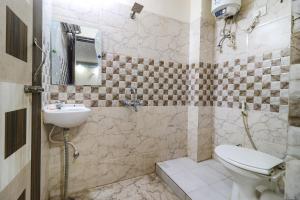 Kylpyhuone majoituspaikassa FabHotel Magadh Palace