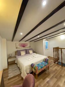 a bedroom with a large bed in a room at Apartman u srcu antičke Pule in Pula