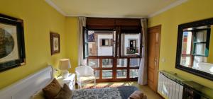 Posezení v ubytování El Capricho de Cangas 2H - WiFi - Garaje - Hidromasaje - VUT-3001-AS