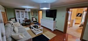 Posezení v ubytování El Capricho de Cangas 2H - WiFi - Garaje - Hidromasaje - VUT-3001-AS