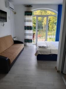 Postel nebo postele na pokoji v ubytování Sofial Guesthouse