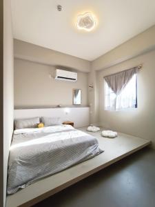 Vuode tai vuoteita majoituspaikassa tinytiny house