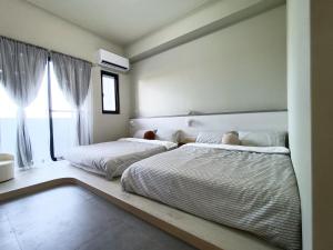 Vuode tai vuoteita majoituspaikassa tinytiny house