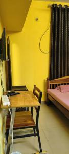 TV a/nebo společenská místnost v ubytování Comfort Rooms and Dormitory