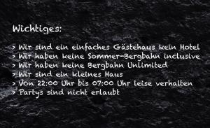 a poem written in white on a black background at Drachenfels in Oberstdorf