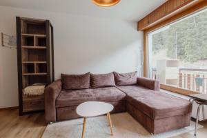 Posezení v ubytování Appartement ski in&out à Thyon