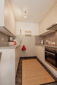 Kuchyň nebo kuchyňský kout v ubytování Appartement ski in&out à Thyon