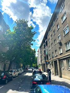 a street with cars parked on the side of the road at Apartment Helen - Old Town, AC in Bratislava