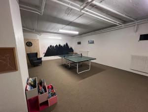 Herní místnost v ubytování Appartement ski in&out à Thyon