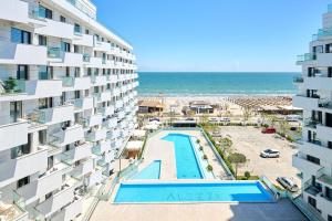 Πισίνα στο ή κοντά στο MIRA Studio in Infinity Beach Resort - parking