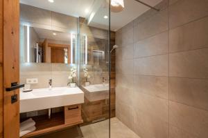 חדר רחצה ב-Hotel Pension Alpengruß
