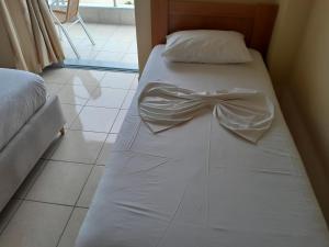 Postel nebo postele na pokoji v ubytování Hotel Prinos + 7 fotografií