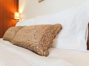 Postel nebo postele na pokoji v ubytování Refúgio à Beira Mar