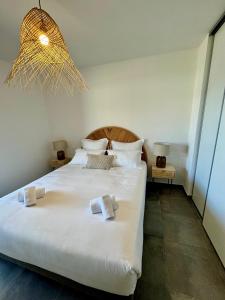 Postel nebo postele na pokoji v ubytování Appartement confort vue mer