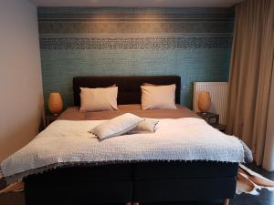 Voodi või voodid majutusasutuse B&B De Vlierbeek toas