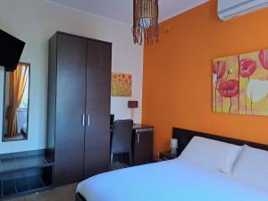 A bed or beds in a room at B&B Domu Mea