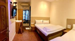 Postel nebo postele na pokoji v ubytování Hotel Volga 2