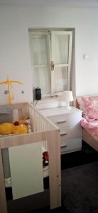 Postel nebo postele na pokoji v ubytování Guesthouse DARKWOOD