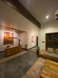 Ein Sitzbereich in der Unterkunft Uma Residence and Suites