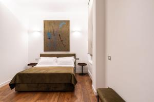 Postel nebo postele na pokoji v ubytování Panoramic Flat-Les Suites
