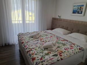 Postel nebo postele na pokoji v ubytování Rooms & Apartment Mama Mia