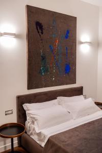 Postel nebo postele na pokoji v ubytování Panoramic Flat-Les Suites