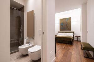 Koupelna v ubytování Panoramic Flat-Les Suites + 37 fotografií