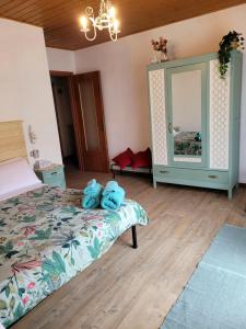 Postel nebo postele na pokoji v ubytování Casa Pepe con parcheggio