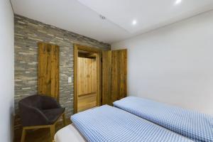 Posteľ alebo postele v izbe v ubytovaní Haus Silvretta NOVA