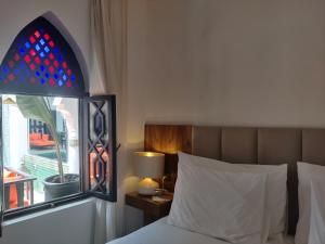Postel nebo postele na pokoji v ubytování The Grand Riad and Spa