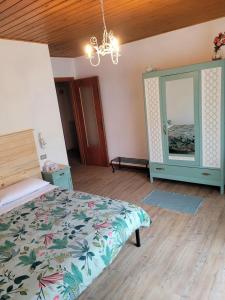 Postel nebo postele na pokoji v ubytování Casa Pepe con parcheggio