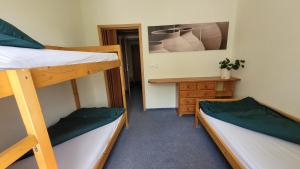 Postel nebo postele na pokoji v ubytování Pension Patanka