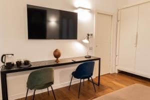 TV a/nebo společenská místnost v ubytování Panoramic Flat-Les Suites