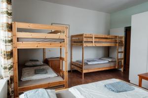 Ένα ή περισσότερα κρεβάτια σε δωμάτιο στο Gruppenhaus Lindenhof Churwalden