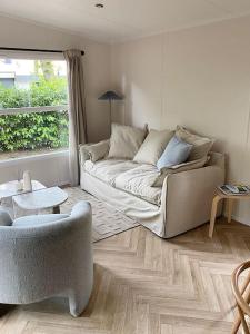 Posezení v ubytování Noya Tinyhouse Veluwe Hoenderloo